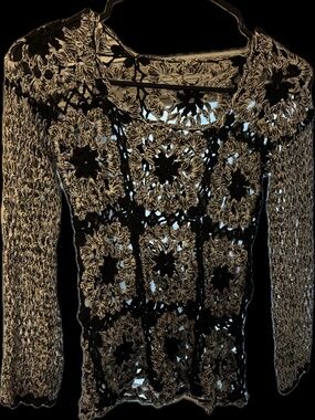 Whimsical goth knitwear